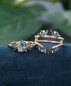 "Pear shaped Moss agate engagement ring set Vintage rose gold Marquise engagement set Enhancer moissanite wedding ring set Anniversary gift -----Ring Information----- Engagement ring +Center stone: 6*8mm Moss agate +Cut type: Pear shaped +Side Stone: Moss agate Approx weight: 0.3ctw Wedding band  +Stones: Moss agate & Diamonds or Moissanite Approx weight: 0.53ctw Metal : Solid 14k/18k yellow gold white gold or rose gold, other metal or gemstones, please contact me! Click on the \"Pin It\" icon i Botanical Engagement Ring, Dream Forest, Emerald Engagement Ring Set, Moissanite Wedding Ring Set, Moissanite Ring Set, Ring Inspo, Cute Engagement Rings, Future Engagement Rings, Agate Engagement Ring