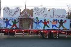 a large truck decorated with christmas decorations and gingerbreads on it's flatbed