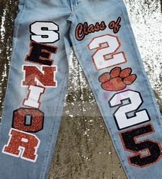 Senior Jeans Orange And Black, Senior Jeans Spiderman, Senior Jeans Inspo 2025, Homecoming Senior Pants, Senior Jeans Red And Black, Black Senior Jeans, Senior 2025 Jeans, Senior Pants 2025, Senior Year Pants