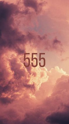 the sky is filled with clouds and numbers that read 555 in gold on it