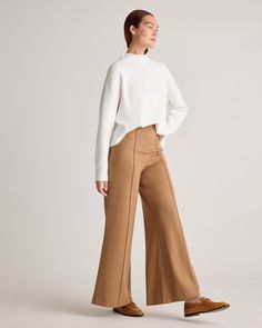 Our Ultra-Stretch Ponte Super Wide Leg Pants is the perfect combination of comfort and style for any occasion. Crafted from high-quality ponte fabric with an ultra-stretchy feel, these pants provide a flattering wide leg cut and an extra high-rise waistband for an elongating and chic fit while ensuring all-day comfort. Pair it with a blouse and heels for a sophisticated office look, or dress it down with a t-shirt and sneakers for a casual daytime look.  | Quince | Women's Ultra-Stretch Ponte Su Shoes For Wide Leg Pants, Super Wide Leg Pants, Silk Halter Top, Sophisticated Office, 2024 Outfits, Ponte Fabric, Short Torso, Ponte Pants, Navy Pants