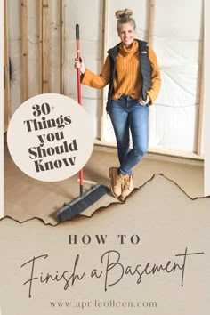 a woman standing on top of a floor with a broom in her hand and the words how to finish a basement