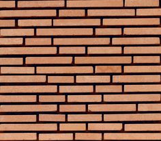 a brick wall made out of red bricks