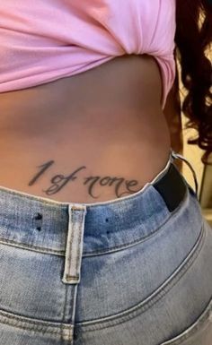 a woman's stomach with the words i love you written on her lower back