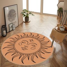 a sun and moon rug on the floor