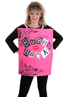 a woman in a pink book costume holding up a sign with the word boo on it