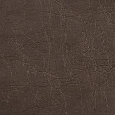 a brown leather textured background or wallpaper