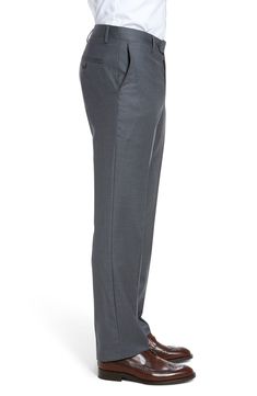 Stretch-infused wool gabardine defines handsome trousers crafted in a crisp, versatile flat-front cut. 16 1/2" leg opening; 9 1/4" front rise; 14 3/4" back rise Zip fly with button-tab closure Slant pockets; back button-closure welt pockets Unhemmed. These trousers can be hemmed for free at your local Nordstrom. Find a store Lined to the knee 98% wool, 2% spandex Dry clean Imported Men's Clothing Full Length Solid Wool Pants, Solid Full-length Wool Pants, Full Length Wool Pants, Elegant Full Length Work Pants For Business, Classic Work Pants With Straight Hem For Office, Classic Office Work Pants With Straight Hem, Classic Straight Hem Work Pants For Office, Formal Flat Front Dress Pants With Belt Loops, Formal Wool Dress Pants With Pressed Crease