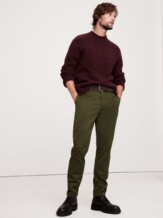 Tailored.  Performance.  Rapid Movement Chinos are built for everyday, designed to do more thanks to a high-stretch fabric that looks sophisticated, resist wrinkles, and is equally sturdy and soft.  High-Stretch, Wrinkle-Resistant.  Athletic Tapered Fit: Designed for those who like more room through the seat and thigh.  Mid rise, tapered leg.  13. 5" leg opening (from size 32).  In-Conversion Cotton: Banana Republic has made a commitment to source in-conversion and organic cotton from a co-op of Mens Green Chinos, Casual Green Tapered Leg Chinos, Olive Green Mens Dress Pants, Men’s Olive Green Pants Outfit, Green Tapered Leg Chinos With Pockets, Olive Green Pants, Blue Horse, Mens Chinos, Green Pants