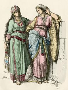 two women in ancient clothing standing next to each other