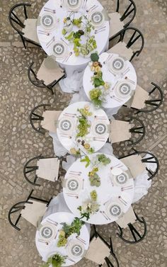 an overhead view of a table and chairs set up for a formal dinner or party