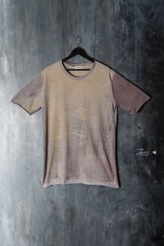 Naturally dyed cotton top. Loose fit dystopian long t-shirt. Seamless sleeves and bottom. Fabric is hand dyed using organic plant matter. Each piece is dyed individually and no two can ever be the same. One size Measurements: Chest: 120 cm / 47.2'' Waist: 114 cm / 44.9'' Shoulders: 56 cm / 22'' Sleeve: 30 cm / 11.8'' Length: 86 cm / 33.8'' One of the kind top! #127 Faded Pre-washed Cotton T-shirt, Acid Wash Cotton T-shirt With Natural Dye, Short Sleeve Cotton T-shirt With Natural Dye, Bleached Cotton Crew Neck T-shirt, Brown Distressed Cotton Tops, Natural Dye Tie-dye Cotton Tops, Faded Cotton Tops Pre-washed, Cotton Tie-dye Top With Natural Dye, Cotton Tie Dye Tops With Natural Dye