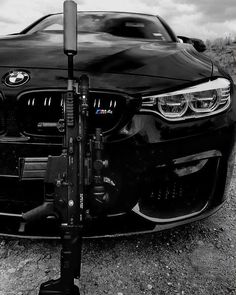 a black and white photo of a bmw