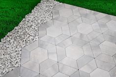 Smooth, clean pavers create a contemporary look. Perfect for patios, walkways, and outdoor rooms. Mix and match with Hexagon paver to create geometric patterns. Subtle light gray color tone. Color, dimension, weight and texture may vary slightly due to natural materials used during manufacturing. Oldcastle 12-in L x 5-in W x 2-in H Trapezoid Rio Blend Concrete Patio Stone in Gray | 10996061 Patio Paver Patterns, Hexagon Pavers Patio, Backyard Landscaping Pavers, Rowhouse Backyard, Outdoor Patio Tile Ideas, Hexagon Pavers, Backyard Paver Ideas, Hexagon Patio, Backyard Hardscape