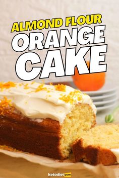 an orange cake with white frosting on top and the words almond flour above it