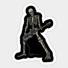 a skeleton with a guitar sticker on it