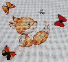 the cross stitch pattern shows an orange fox and butterflies