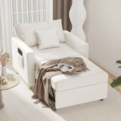 a living room with a white couch and coffee table in front of a curtained window