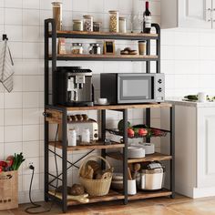 a microwave oven sitting on top of a wooden shelf