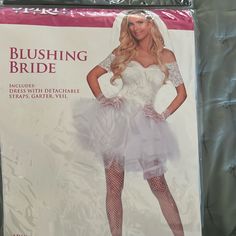 a woman wearing a white dress and fishnet stockings in front of a plastic package