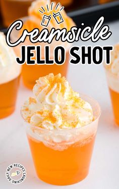 an advertisement for jell - o shots with orange juice and whipped cream on top