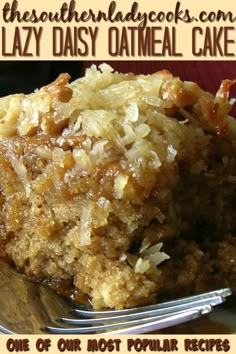 a close up of a piece of cake on a plate with a fork in it