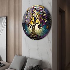 a living room scene with focus on the couch and large circular stained glass wall art