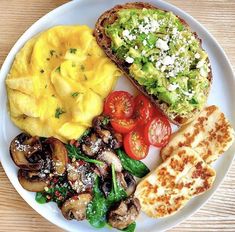 a white plate topped with different types of food