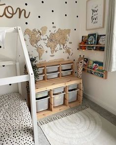 a child's bedroom with a bunk bed, bookshelf and toy bins