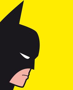 the face of batman in black and yellow