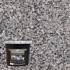 a can of terrazzo is sitting on the ground