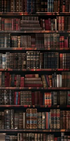 an old book shelf filled with lots of books