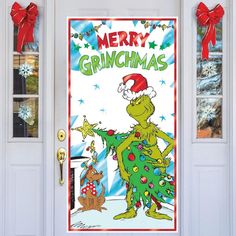 the grinch door cover is decorated with christmas decorations