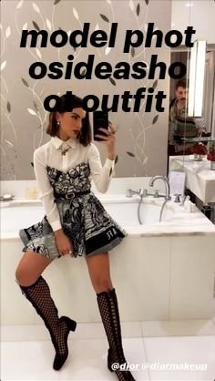 a woman taking a selfie in front of a bathroom mirror with the caption model phot osideasho oquifit