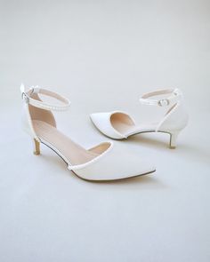 Shop our women shoes collection in glitter, satin and lace. Comfortable wear for bridal party, formal wear, night out and weddings. FREE SHIPPING IN U.S FOR ORDERS $100 AND MORE! Elegant Pearl Embellished Ankle Strap Heels, Feminine Wedding Flats, Chic Low Heel Pearls Embellished Heels, Chic Pearl Embellished Ankle Strap Wedding Shoes, Elegant Flat Heel Wedding Shoes With Heel Strap, Elegant Flat Heel Wedding Shoes With Strap, Elegant Fitted Kitten Heels With Low Heel, Elegant Kitten Heels With Heel Strap, Elegant Cream Kitten Heels For Formal Occasions