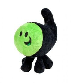 a black and green stuffed animal with a smile on it's face