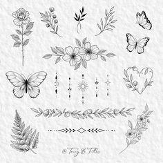 some flowers and butterflies are drawn on paper