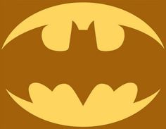 the batman symbol is shown on a brown background