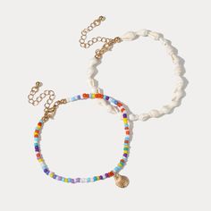 Adorn your ankles with the vibrant hues of the ocean using our Cowrie Shell Rainbow Beaded Anklet Set. This exquisite collection features a waterproof gemstone seed beaded anklet, elegantly made with 18K gold-plated brass, and embellished with authentic cowrie shells. Each anklet is a celebration of color and craftsmanship, designed to withstand the elements while adding a touch of bohemian elegance to your every step. Whether you’re strolling on the beach or dancing under the stars, these cowri Beaded Anklet, Cowrie Shells, Rainbow Beads, Beaded Anklets, Cowrie Shell, Free Spirited, Shell Beads, Under The Stars, Free Spirit