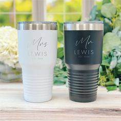 two personalized tumblers sitting next to each other