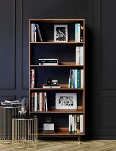 a bookshelf with many books and pictures on it