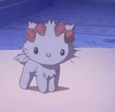 an animated hello kitty is standing on the beach with her hair in pigtails and bows