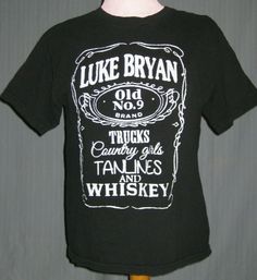 a black t - shirt with white lettering on the front and back of it that says luke bryan