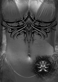 a black and white photo of a woman's breast with an intricate design on it