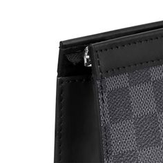 LOUIS VUITTON® - Pochette Voyage Mm - Graphite Louis Vuitton Store, Louis Vuitton Pochette, Louis Vuitton Official, Travel Pouch, Leather Design, A Bag, Cowhide Leather, Easy Access, Leather Trims