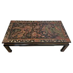 A stunning large vintage Chinese Ming Dynasty style coffee table, 20th century, in black lacquer with gilt accents, and intricate colorful hand painted and incised design to the rectangular top, depicting mythical scence of Chinese dragon and Fenghuang phoenix fighting, Asian decoration, above a pierced and molded apron, rising on straight Ming style legs. Dimensions: (approx) 18.25" High, 54" Wide, 28.25" Deep Provenance / Acquisition: Property from private estate of a Dallas collector Acquired from Dallas Auction Gallery, Dallas, Texas. Owned and curated by Reyne Hirsch, a media personality and expert in 20th century decorative arts. She's was a top appraiser for Antiques Roadshow on PBS for 13 years, as well as a leading contributer to the Huffington Post, New York Times, Wall Street Jo Rustic Industrial Coffee Table, Chinese Coffee Table, French Chinoiserie, Dragon Chino, Style Coffee Table, Antiques Roadshow, Stone Panels, Industrial Coffee Table, Red Lacquer