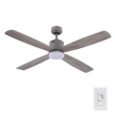 a ceiling fan that is on top of a white wall with a remote control in front of it