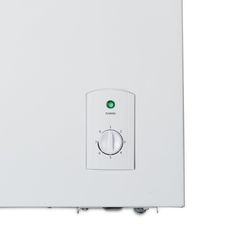 a white wall mounted heater sitting on top of a metal shelf next to a green light