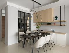 a dining room table with white chairs next to a wall mounted shelf and open shelving