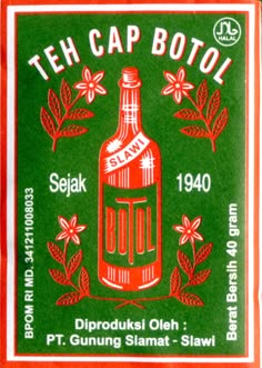 an old bottle label with the words teh cap botol on it and leaves